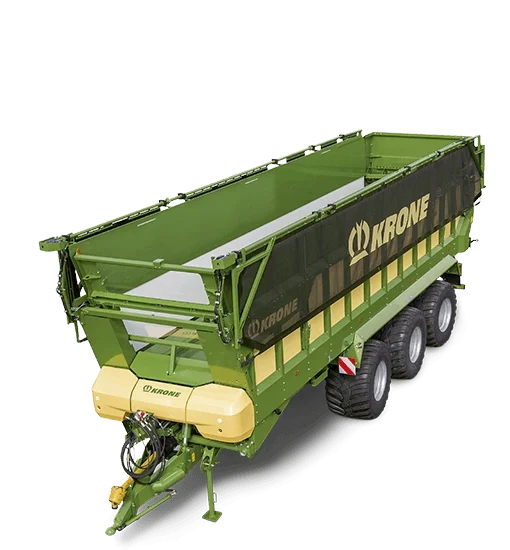 KRONE GX vogntog med grønn farge og tre aksler, fotografert mot sort bakgrunn. Vogntoget har hydraulisk baklem og er designet for transport av landbruksprodukter.